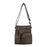 Leather shoulder bag with multiple compartments