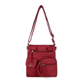 Leather shoulder bag with multiple compartments