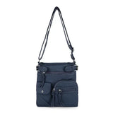 Leather shoulder bag with multiple compartments