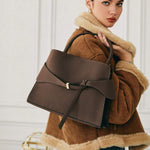 BRIDE — Buckle Strap Top Handle Bag