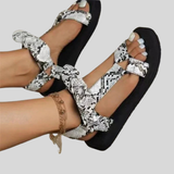 Flat summer sandals with bow and leopard print