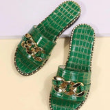 Edith - Mules with crocodile pattern