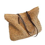 Woven carrier bag with leather straps