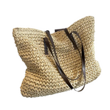 Woven carrier bag with leather straps