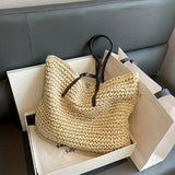 Woven carrier bag with leather straps