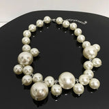 Naomi - Chunky pearl necklace with drop detail