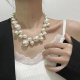 Naomi - Chunky pearl necklace with drop detail