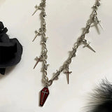 Nyssa - Pearl necklace with embellished cross pendant