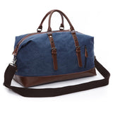 Travel bag with leather details and water-repellent fabric