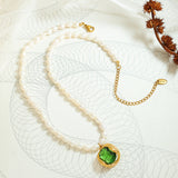 Noor - Elegant pearl necklace with green zircon pendant