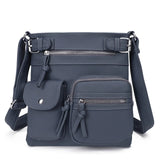 Leather shoulder bag with multiple compartments