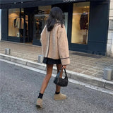 Brielle Edge – Contrast Stitch Shearling Jacket