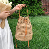 Women's summer straw shoulder bag: Hand-woven drawstring bucket style