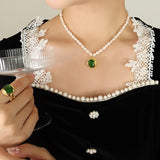 Noor - Elegant pearl necklace with green zircon pendant