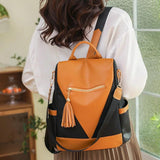 Backpack in two-colour look with tassel pendant