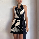 Modinzi Mini Dress black / 8 (S) Women’s Halter Neck Backless Mini Dress – Abstract Print Wrap Design