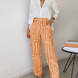 Modinzi Sets Orange / 8 (S) Women’s Two-Piece Set – White Button Shirt & High-Waist Geometric Wide Leg Trousers